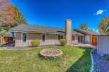 Discover the charm of this beautiful home, featuring a well-maintained exterior and a welcoming backyard.