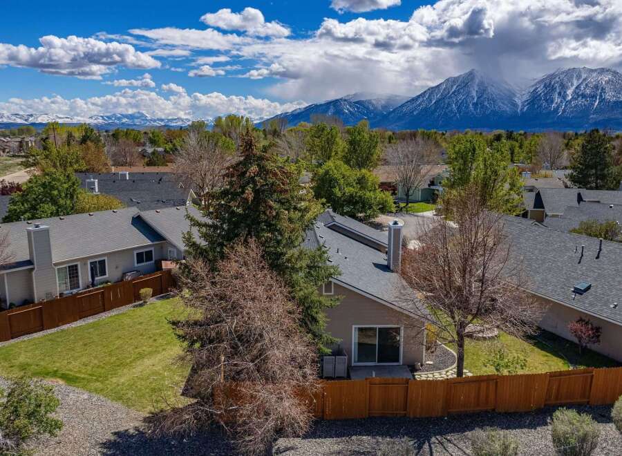 This beautiful property offers stunning mountain views and a well-maintained exterior.