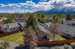 This beautiful property offers stunning mountain views and a well-maintained exterior.