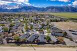Discover the charm of this beautiful neighborhood nestled against a stunning mountain backdrop.