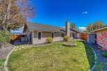 Enjoy the tranquility of this beautiful home with a spacious backyard, perfect for outdoor gatherings.