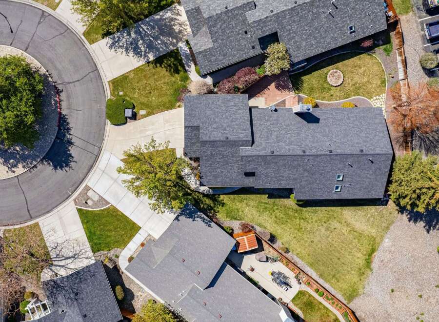 Discover this stunning property featuring a beautifully designed home with a modern roof and well-maintained landscaping.