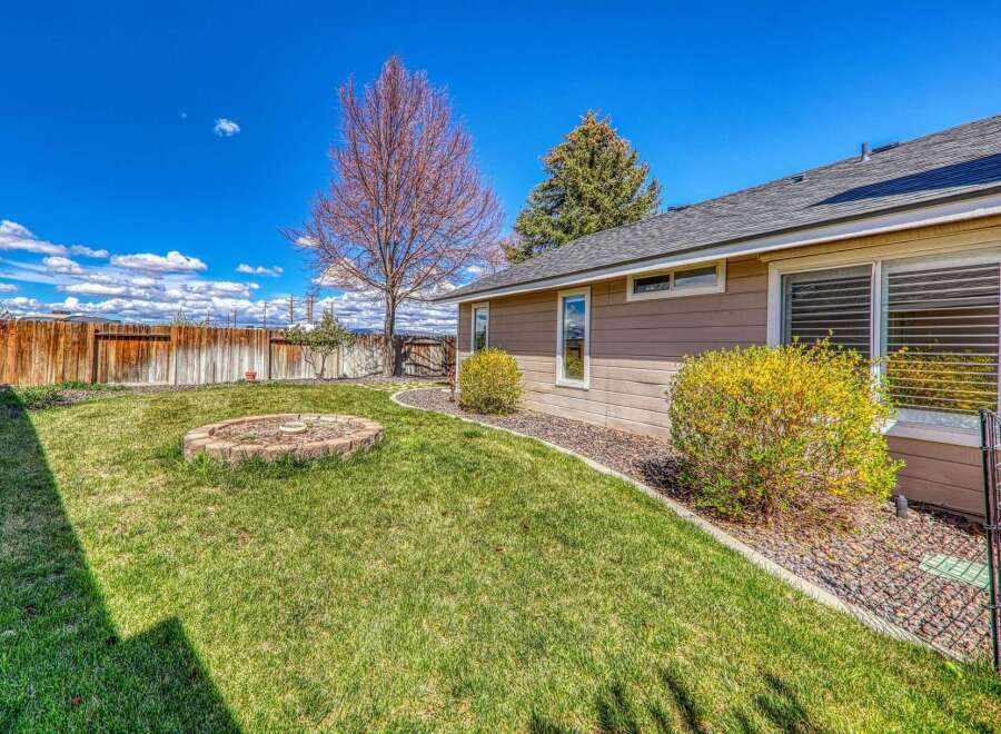 Discover the charm of this beautiful property, featuring a well-maintained backyard perfect for relaxation and entertainment.
