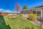 Discover the charm of this beautiful property, featuring a well-maintained backyard perfect for relaxation and entertainment.