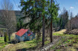 Discover a charming property nestled in a serene natural setting.