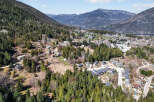 Nestled amidst the stunning mountain landscape, this property offers a serene escape.