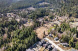 Discover a stunning property nestled in a serene, wooded area, offering a perfect blend of nature and modern living.
