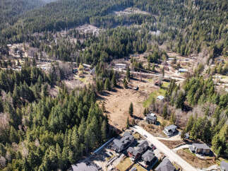 Discover a stunning property nestled in a serene, wooded area, offering a perfect blend of nature and modern living.