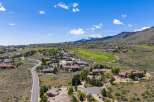Discover luxury living in this stunning property, boasting breathtaking mountain views and a meticulously designed golf course.