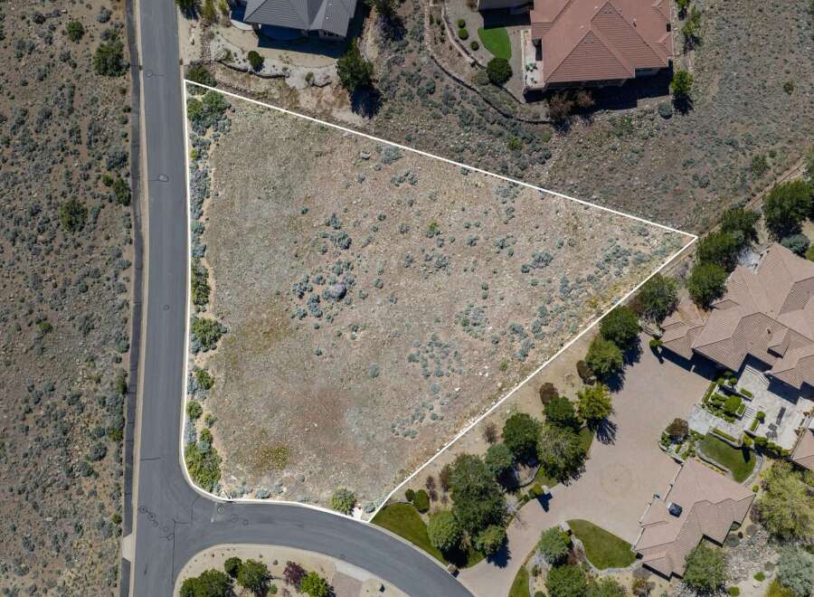 Discover the perfect canvas for your dream home on this expansive, vacant lot.