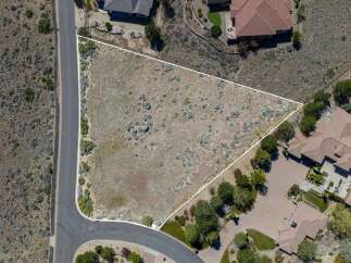 Discover the perfect canvas for your dream home on this expansive, vacant lot.