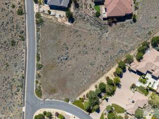 Discover the perfect canvas for your dream home on this expansive vacant lot.