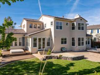 Discover luxury living in this stunning property! This home boasts a beautiful exterior with a spacious backyard, perfect for entertaining.