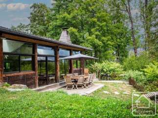 Discover a stunning property nestled in a serene natural setting.