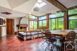 Experience the charm of this stunning property, featuring a spacious living area with a cozy fireplace and ample natural light.