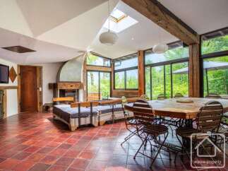 Experience the charm of this stunning property, featuring a spacious living area with a cozy fireplace and ample natural light.