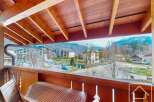 Enjoy breathtaking mountain views from this charming balcony.
