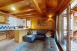 Discover the charm of this cozy property, featuring a beautifully designed interior with wooden accents throughout.