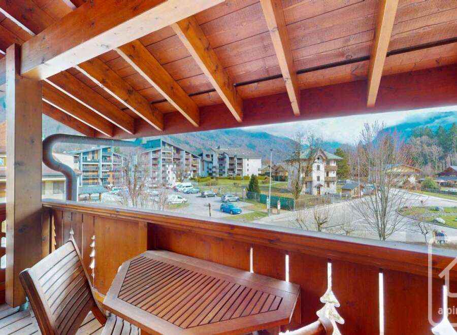 Enjoy breathtaking mountain views from this charming balcony.
