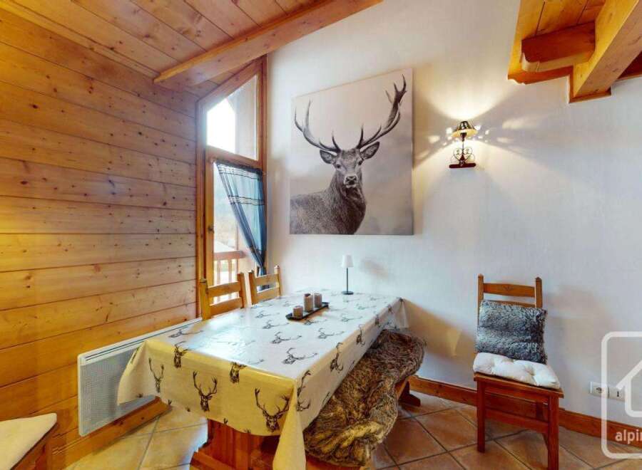 Discover the charm of this cozy dining area, perfect for intimate gatherings.