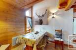 Discover the charm of this cozy dining area, perfect for intimate gatherings.