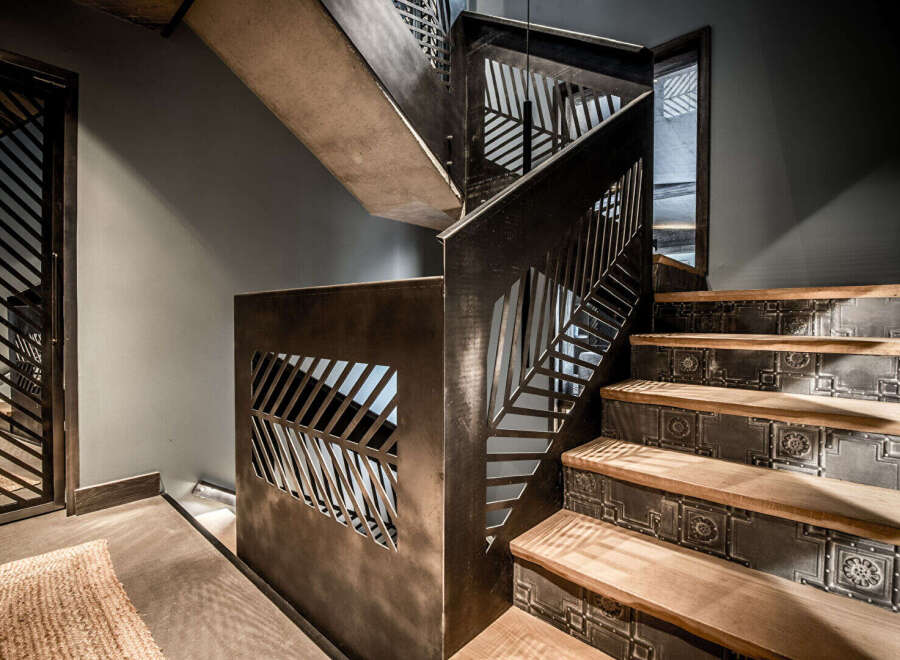 This stunning property boasts a unique staircase design, showcasing modern architecture and luxurious finishes.