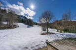 Nestled in a serene mountain landscape, this property offers a unique blend of natural beauty and comfortable living.