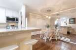 Step into this inviting kitchen and dining area, perfect for both everyday living and entertaining.