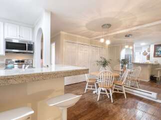 Step into this inviting kitchen and dining area, perfect for both everyday living and entertaining.