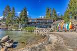 Discover lakeside living at its finest! This stunning property boasts direct beach access, perfect for water activities.