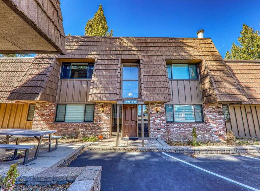 Discover a charming property featuring a unique architectural design and a welcoming entrance.