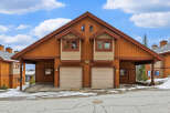 This stunning property features a charming exterior with a unique architectural design.