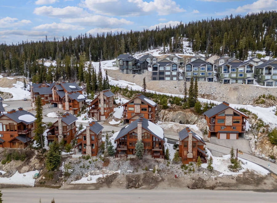 Nestled in a picturesque mountain setting, this stunning property offers luxurious living with breathtaking views.
