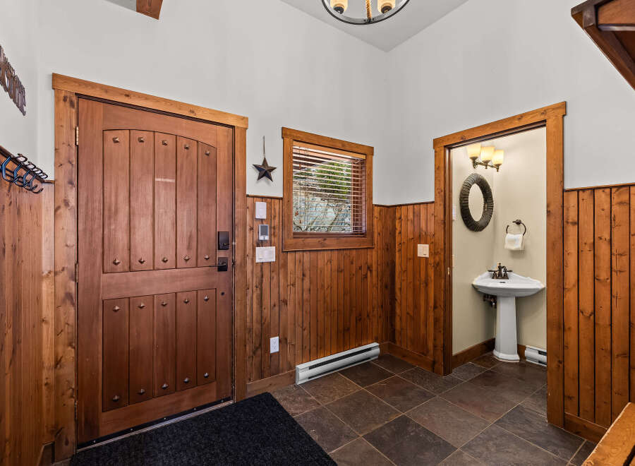 Step into rustic elegance with this inviting entryway.