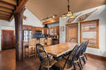 This stunning kitchen and dining area boasts rustic charm and modern amenities.