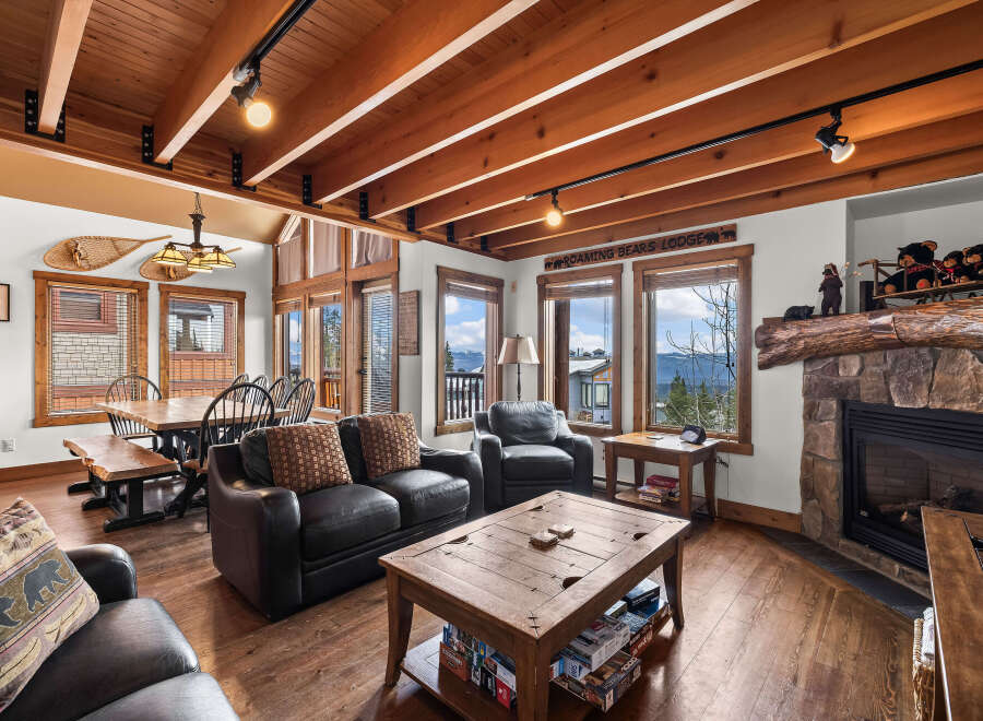 Step into a cozy mountain retreat with this stunning living space.