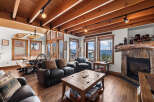 Step into a cozy mountain retreat with this stunning living space.