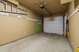 This spacious garage offers ample storage and parking space.