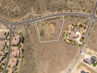 Discover the perfect canvas for your dream home on this expansive vacant lot.