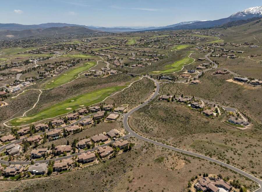 Discover luxury living in this stunning golf course community, offering breathtaking views and unparalleled privacy.