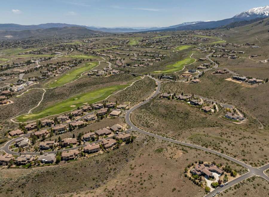 Discover luxury living in this stunning golf course community, offering breathtaking views and unparalleled privacy.