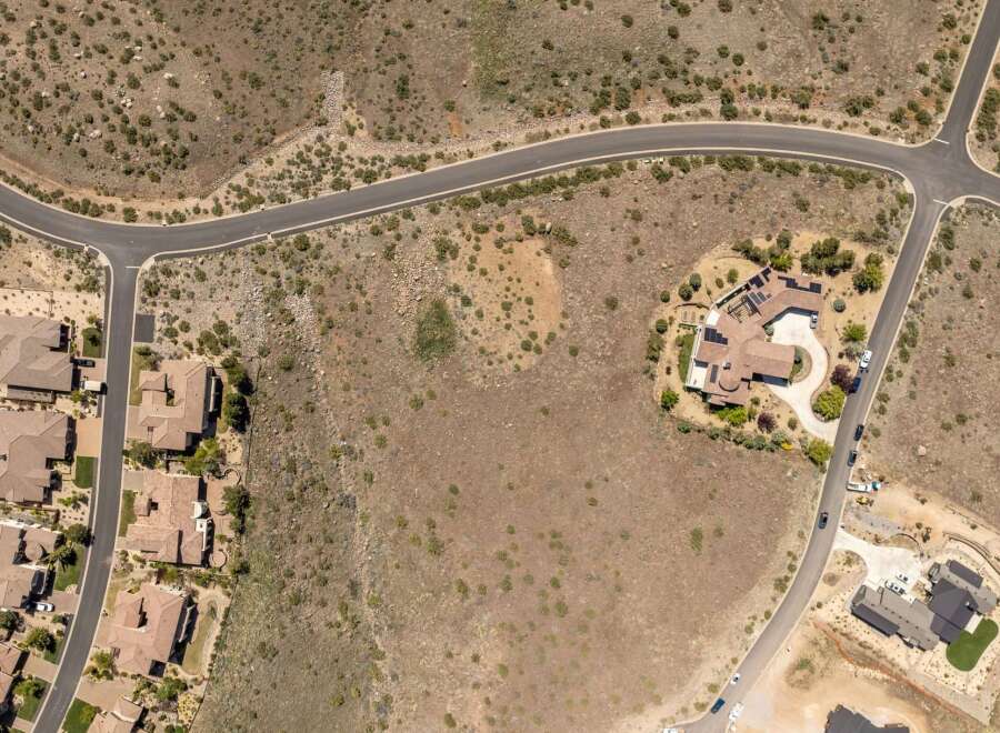 Discover the perfect canvas for your dream home on this expansive vacant lot.