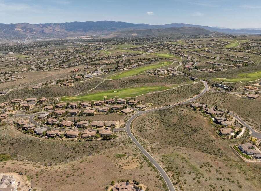 Discover luxury living in this stunning golf course community, offering breathtaking views and unparalleled privacy.