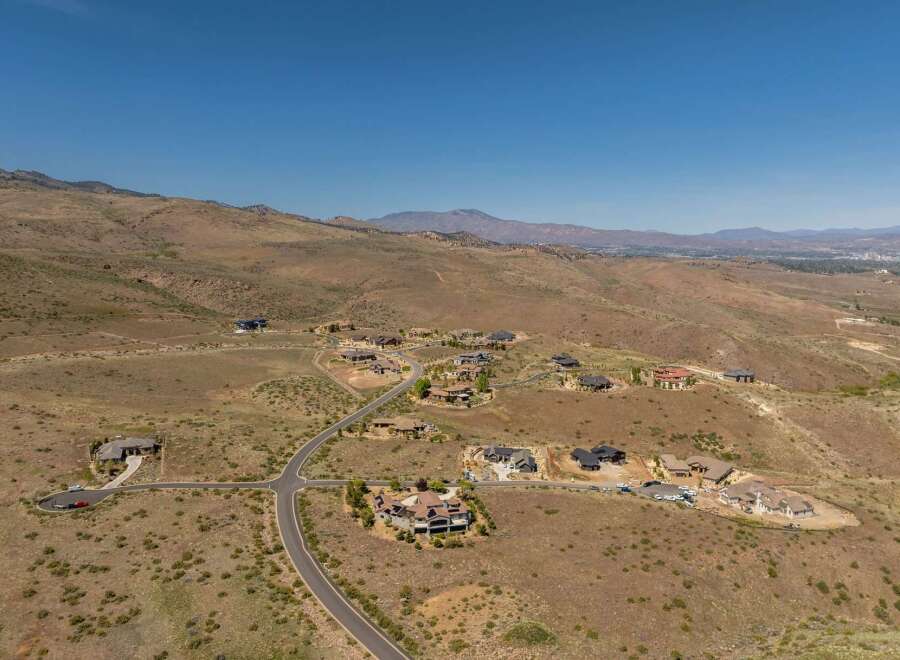 Discover luxury living in this stunning hillside community, offering breathtaking views and unparalleled privacy.