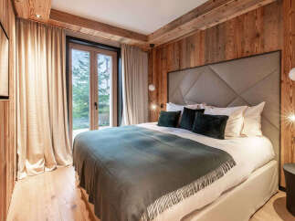 Experience luxury and comfort in this stunning bedroom.
