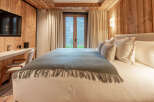Experience luxury and tranquility in this stunning bedroom.