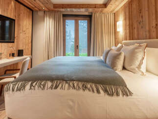 Experience luxury and tranquility in this stunning bedroom.