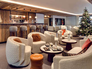 Step into luxury and comfort in this stunning property, featuring a beautifully designed bar area perfect for entertaining guests.