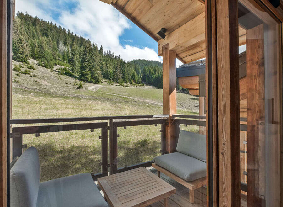 Experience breathtaking mountain views from this charming balcony, perfect for enjoying your morning coffee or evening relaxation.