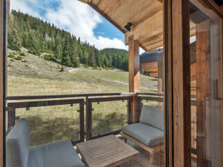 Experience breathtaking mountain views from this charming balcony, perfect for enjoying your morning coffee or evening relaxation.
